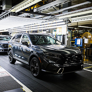 A row of cars in a factory