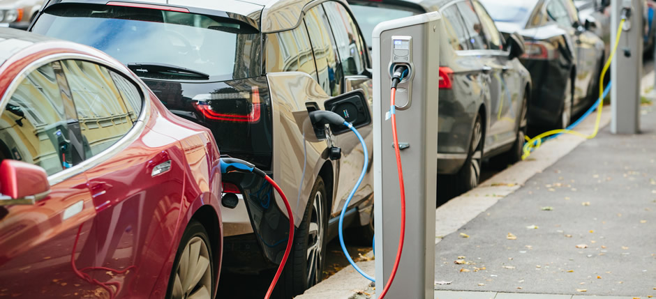 Electric vehicles connected to charging stations