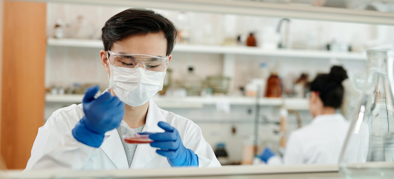 A researcher doing testing in a lab